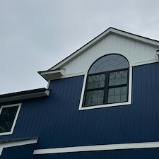 Siding-Soffits-Black-Windows-Installation-in-Sound-Beach-NY-All-Pro-Remodeling 1